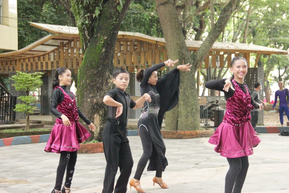Suasana Konser Amal Doa, Donasi, dan Aksi Seni di Kambang Iwak Park Palembang, Sabtu–Minggu (27–28/12/2025).