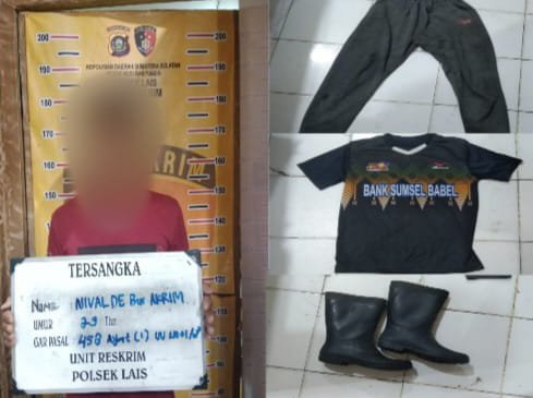 Pelaku pembunuhan pemuda di kebun sawit Muba berinisial NDA (28) saat diamankan polisi untuk menjalani pemeriksaan di Polsek Lais.
