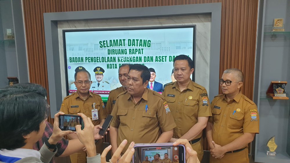 Kepala BPKAD Kota Palembang Ahmad Nashir saat menyampaikan capaian realisasi anggaran tahun 2025 yang mencapai 91,67 persen serta strategi optimalisasi PAD melalui program Anti Mager, Selasa (6/1/2026).