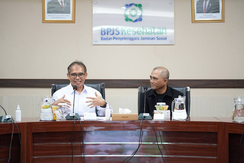 Penandatanganan Perjanjian Kerja Sama antara BPJS Kesehatan dan PT GoTo Gojek Tokopedia Tbk dalam rangka memperkuat perlindungan jaminan kesehatan bagi pengemudi mitra Gojek melalui Program JKN.