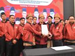 Ketua PW Fokal IMM Sumatera Selatan periode 2025–2030, Ruspanda Karibullah, bersama pengurus usai resmi dilantik di Wyndham Opi Hotel Palembang, Sabtu (14/2/2026).